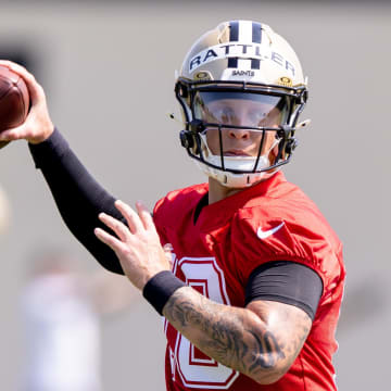 May 11, 2024; New Orleans, LA, USA;  New Orleans Saints quarterback Spencer Rattler (18) runs drills during the rookie minicamp at the Ochsner Sports Performance Center. Mandatory Credit: Stephen Lew-USA TODAY Sports