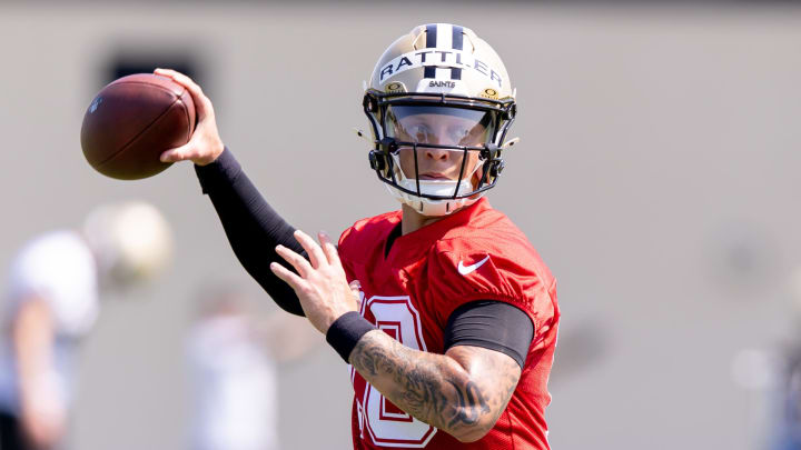 May 11, 2024; New Orleans, LA, USA;  New Orleans Saints quarterback Spencer Rattler (18) runs drills during the rookie minicamp at the Ochsner Sports Performance Center. Mandatory Credit: Stephen Lew-USA TODAY Sports