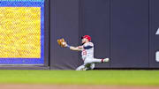 Sep 4, 2024; Milwaukee, Wisconsin, USA;  St. Louis Cardinals center fielder Michael Siani (63) slides while trying to catch the ball hit by Milwaukee Brewers second baseman Brice Turang (2) (not pictured) during the third inning at American Family Field. Mandatory Credit: Jeff Hanisch-Imagn Images