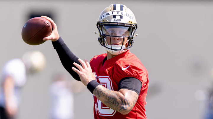 May 11, 2024; New Orleans, LA, USA;  New Orleans Saints quarterback Spencer Rattler (18) runs drills during the rookie minicamp at the Ochsner Sports Performance Center. Mandatory Credit: Stephen Lew-USA TODAY Sports