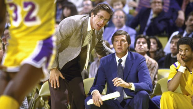 Jerry West on the sideline coaching the Los Angeles Lakers.