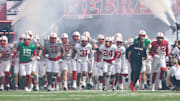 The team enters the field prior to the 2024 Nebraska football spring game.