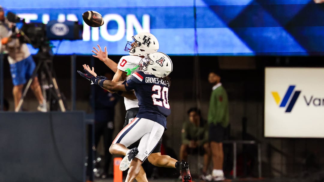 Nov 15, 2024; Tucson, Arizona, USA; Houston Cougars wide receiver Joseph Manjack IV (0) catches the balls during the fourth quarter against the Arizona Wildcats at Arizona Stadium. Mandatory Credit: Aryanna Frank-Imagn Images