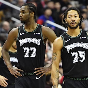 Mar 3, 2019; Washington, DC, USA; Minnesota Timberwolves forward Andrew Wiggins (22) and guard Derrick Rose (25) on the court against the Washington Wizards during the first quarter at Capital One Arena. Mandatory Credit: Brad Mills-Imagn Images