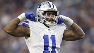 Oct 3, 2021; Arlington, Texas, USA;  Dallas Cowboys linebacker Micah Parsons (11) reacts after a sack in the fourth quarter against the Carolina Panthers at AT&T Stadium. Mandatory Credit: Tim Heitman-Imagn Images