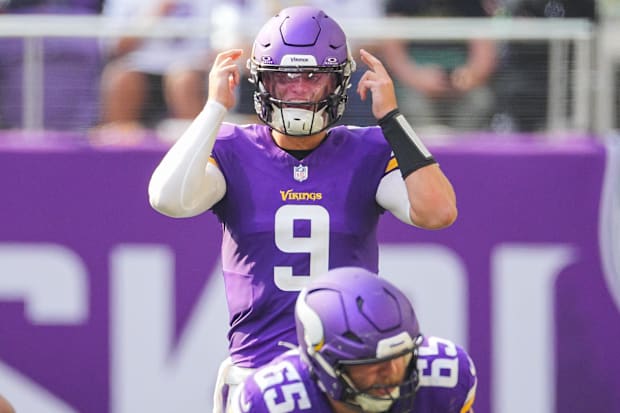Minnesota Vikings QB J.J. McCarthy under center against the Las Vegas Raiders in the third quarter at U.S. Bank Stadium.