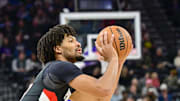 Oct 16, 2025; Salt Lake City, Utah, USA; Portland Trail Blazers guard Shaedon Sharpe (17) makes a three point shot against the Utah Jazz during the first half at Delta Center. Mandatory Credit: Peter Creveling-Imagn Images