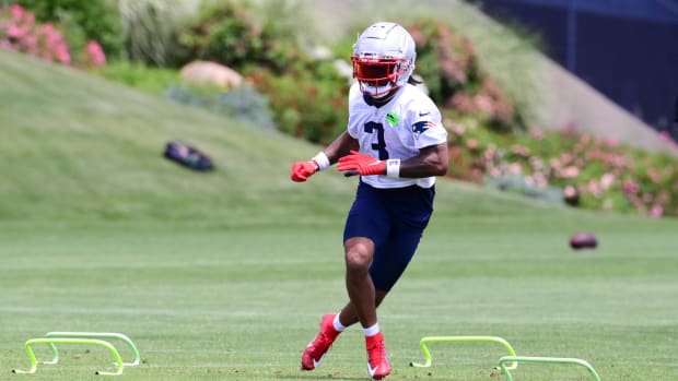 New England Patriots wide receiver DeMario Douglas (3) runs a drill at minicamp at Gillette Stadium.