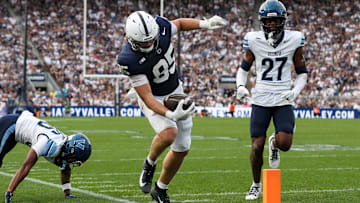 Sep 13, 2025; University Park, Pennsylvania, USA; Penn State Nittany Lions tight end Luke Reynolds (85) runs with the ball while trying to stay in bounds during the third quarter against the Villanova Wildcats at Beaver Stadium. Mandatory Credit: Matthew O'Haren-Imagn Images