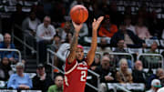 Arkansas Razorbacks guard Boogie Fland (2) shoots the basketball against the Miami Hurricanes during the first half at Watsco Center. 