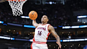 Mar 23, 2024; Salt Lake City, UT, USA; Arizona Wildcats forward Keshad Johnson (16) dunks against Dayton Flyers guard Enoch Cheeks (6) during the first half in the second round of the 2024 NCAA Tournament at Vivint Smart Home Arena-Delta Center. Mandatory Credit: Rob Gray-USA TODAY Sports