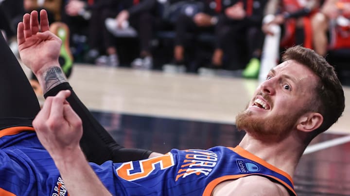 Apr 14, 2024; New York, New York, USA;  New York Knicks center Isaiah Hartenstein (55) yells at an official after falling to the floor in the second quarter against the Chicago Bulls at Madison Square Garden. Mandatory Credit: Wendell Cruz-Imagn Images