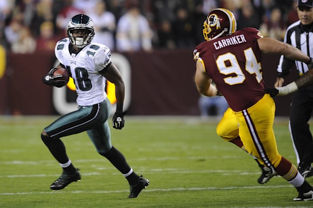 Philadelphia Eagles wide receiver Jeremy Maclin (18) runs after making a catch in front of Washington Redskins defensive end