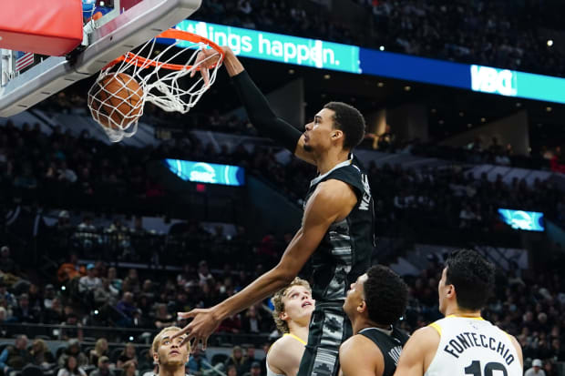 San Antonio Spurs center Victor Wembanyama (1) dunks in front of Utah Jazz forward Lauri Markkanen (23) in the second half.