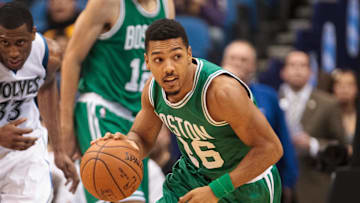 Jan 28, 2015; Minneapolis, MN, USA; Boston Celtics guard Phil Pressey (26) dribbles in the third quarter against the Minnesota Timberwolves at Target Center. The Minnesota Timberwolves beat the Boston Celtics 110-98. Mandatory Credit: Brad Rempel-Imagn Images