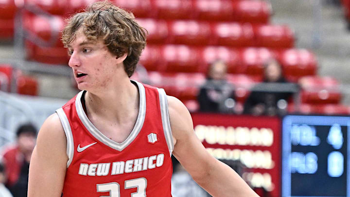 Oct 25, 2025; Pullman, WA, USA; New Mexico Lobos guard Jake Hall (23) controls the ball against the Washington State Cougars in the first half at Friel Court at Beasley Coliseum. Mandatory Credit: James Snook-Imagn Images