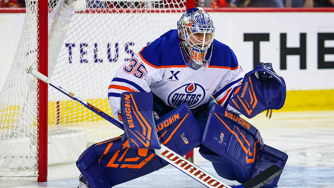 Feb 4, 2026; Calgary, Alberta, CAN; Edmonton Oilers goaltender Tristan Jarry (35) guards his net against the Calgary Flames during the second period at Scotiabank Saddledome. Mandatory Credit: Sergei Belski-Imagn Images