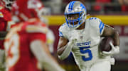 Oct 12, 2025; Kansas City, Missouri, USA; Detroit Lions running back David Montgomery (5) rushes the ball against the Kansas City Chiefs during the second half at GEHA Field at Arrowhead Stadium. Mandatory Credit: Jay Biggerstaff-Imagn Images