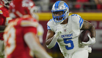 Oct 12, 2025; Kansas City, Missouri, USA; Detroit Lions running back David Montgomery (5) rushes the ball against the Kansas City Chiefs during the second half at GEHA Field at Arrowhead Stadium. Mandatory Credit: Jay Biggerstaff-Imagn Images