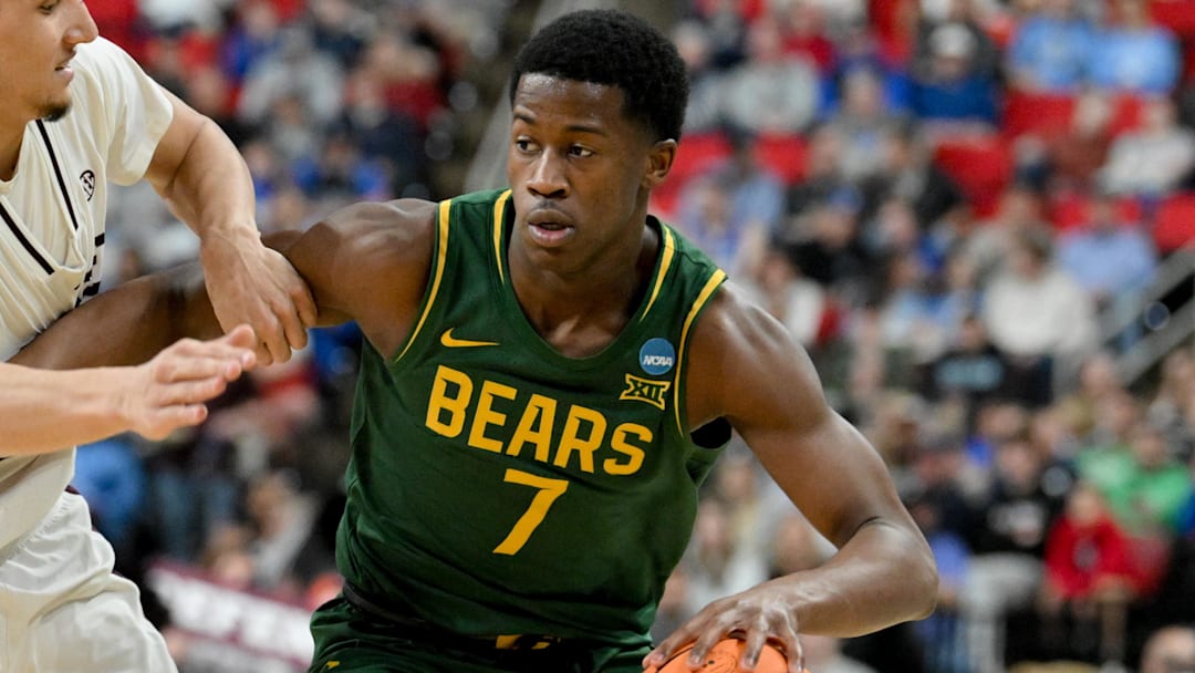 Mar 21, 2025; Raleigh, NC, USA; Mississippi State Bulldogs forward RJ Melendez (22) defends against Baylor Bears guard VJ Edgecombe (7) during the second half in the first round of the NCAA Tournament at Lenovo Center. Mandatory Credit: Zachary Taft-Imagn Images