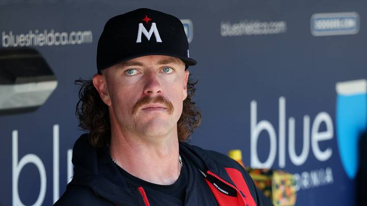 Jul 23, 2025; Los Angeles, California, USA;  Minnesota Twins starting pitcher Chris Paddack (20) looks on in the dugout after pitching sixth inning against the Los Angeles Dodgers at Dodger Stadium. Mandatory Credit: Kiyoshi Mio-Imagn Images