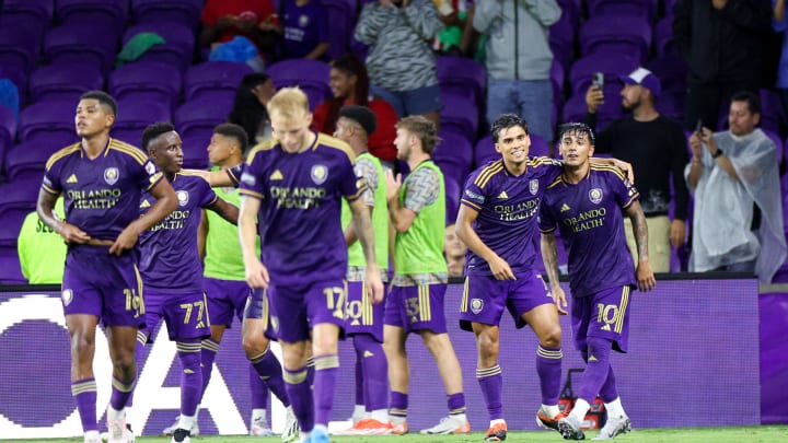 Aug 4, 2024; Orlando, Florida, USA; Orlando City forward Ramiro Enrique (7) celebrates with midfielder Facundo Torres (10) after scoring a goal against Atletico de San Luis in the first half during the Leagues Cup group stage at INTER&CO Stadium. Mandatory Credit: Nathan Ray Seebeck-USA TODAY Sports