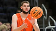 Mar 20, 2025; Milwaukee, WI, USA; Illinois Fighting Illini center Tomislav Ivisic (13) works out NCAA Tournament First Round Practice at Fiserv Forum. Mandatory Credit: Benny Sieu-Imagn Images