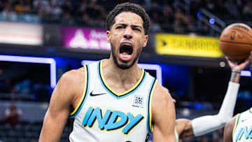 Dec 15, 2024; Indianapolis, Indiana, USA; Indiana Pacers guard Tyrese Haliburton (0) celebrates a made shot  in the second half against the New Orleans Pelicans at Gainbridge Fieldhouse. Mandatory Credit: Trevor Ruszkowski-Imagn Images
