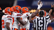 Aug 30, 2025; Atlanta, Georgia, USA; Syracuse Orange defensive lineman David Reese (8) celebrates after a fumble recovery against the Tennessee Volunteers in the first quarter at Mercedes-Benz Stadium. Mandatory Credit: Brett Davis-Imagn Images