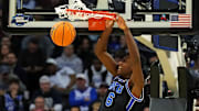 Mar 27, 2025; Newark, NJ, USA; Brigham Young Cougars forward Kanon Catchings (6) dunks the ball during the first half against the Alabama Crimson Tide during an East Regional semifinal of the 2025 NCAA tournament at Prudential Center. 