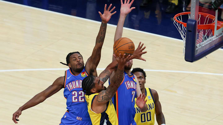 Jun 19, 2025; Indianapolis, Indiana, USA; Indiana Pacers forward Obi Toppin (1) shoots the ball against Oklahoma City Thunder guard Cason Wallace (22) and forward Chet Holmgren (7) in the first quarter during game six of the 2025 NBA Finals at Gainbridge Fieldhouse. Mandatory Credit: Trevor Ruszkowski-Imagn Images