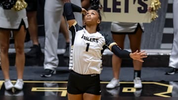 Purdue Redshirt Sophomore Rachel Williams (1) serves 