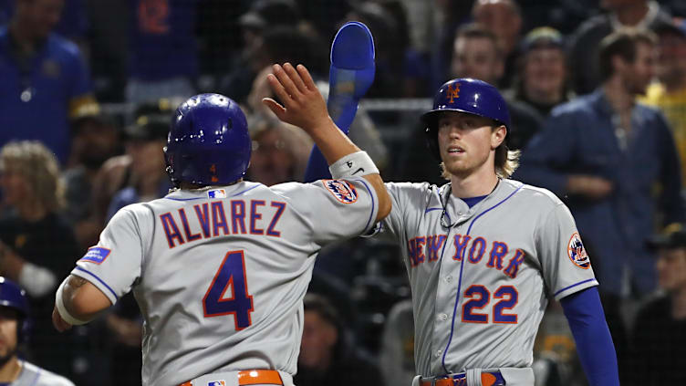 Jun 9, 2023; Pittsburgh, Pennsylvania, USA;  New York Mets catcher Francisco Alvarez (4) and center