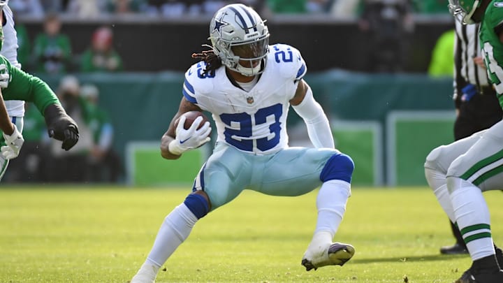 Dec 29, 2024; Philadelphia, Pennsylvania, USA; Dallas Cowboys running back Rico Dowdle (23) against the Philadelphia Eagles at Lincoln Financial Field. Mandatory Credit: Eric Hartline-Imagn Images