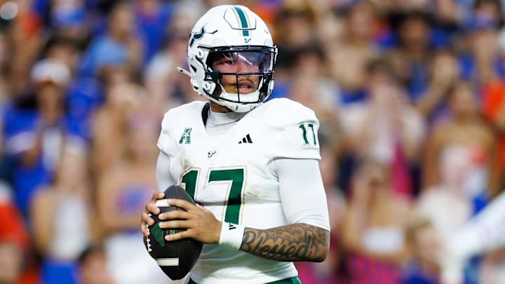 Sep 6, 2025; Gainesville, Florida, USA; South Florida Bulls quarterback Byrum Brown (17) looks to throw against the Florida Gators during the first half at Ben Hill Griffin Stadium. Mandatory Credit: Matt Pendleton-Imagn Images