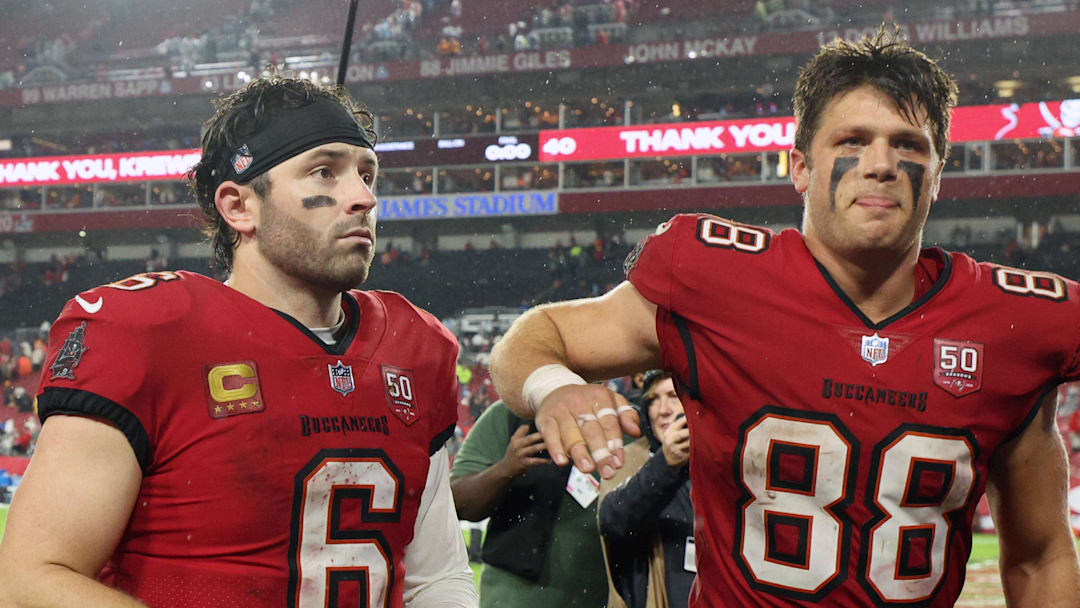 Tampa Bay Buccaneers quarterback Baker Mayfield (6) and tight end Cade Otton (88) leave the field after defeating the Carolina Panthers
