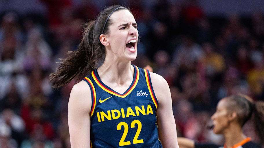 Indiana Fever guard Caitlin Clark (22) celebrates a made basket in the first half against the New York Liberty. | Trevor Ruszkowski-Imagn Images
