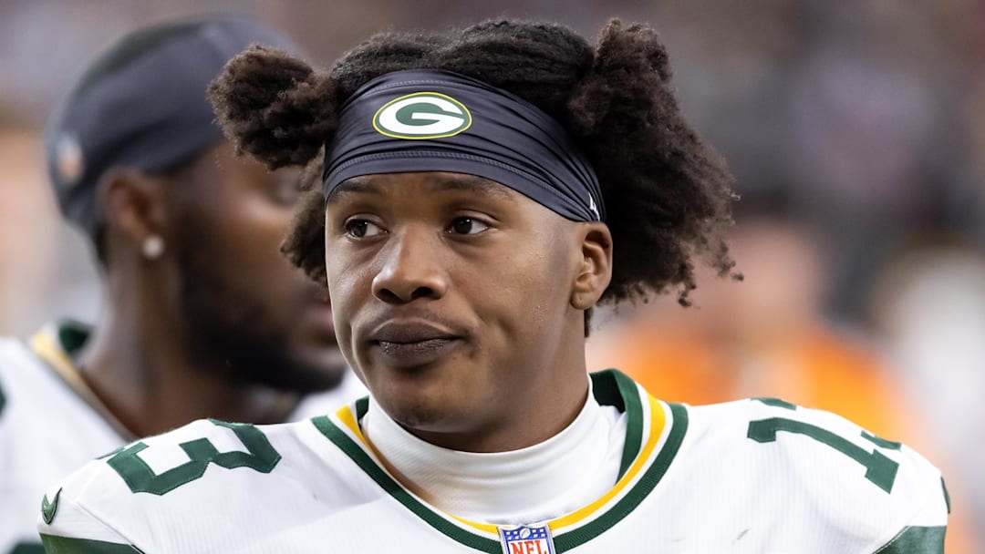 Oct 19, 2025; Glendale, Arizona, USA; Green Bay Packers wide receiver Dontayvion Wicks (13) against the Arizona Cardinals at State Farm Stadium. Mandatory Credit: Mark J. Rebilas-Imagn Images