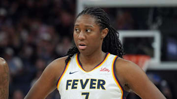 Aug 31, 2025; San Francisco, California, USA; Indiana Fever forwards Natasha Howard (6) and Aliyah Boston (7) stand on the court during the third quarter against the Golden State Valkyries at Chase Center. Mandatory Credit: Darren Yamashita-Imagn Images