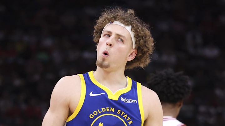 Mar 5, 2026; Houston, Texas, USA; jGolden State Warriors guard Brandin Podziemski (2) reacts after a play during the third quarter against the Houston Rockets at Toyota Center. Mandatory Credit: Troy Taormina-Imagn Images
