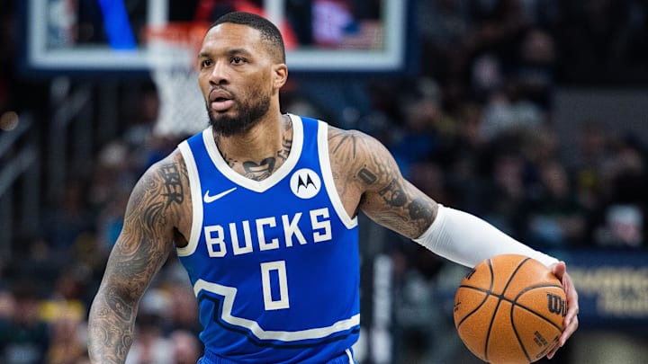 Milwaukee Bucks guard Damian Lillard dribbles the ball. Milwaukee Bucks guard Damian Lillard dribbles the ball.