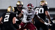 South Carolina Gamecocks edge Kyle Kennard (5) reacts as Vanderbilt Commodores quarterback Diego Pavia (2) protects the ball during the second half at FirstBank Stadium in Nashville, Tenn., Saturday, Nov. 9, 2024.