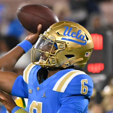 Sep 28, 2024; Pasadena, California, USA; UCLA Bruins quarterback Justyn Martin (6) throws a pass during the fourth quarter against the Oregon Ducks at Rose Bowl. Mandatory Credit: Robert Hanashiro-Imagn Images