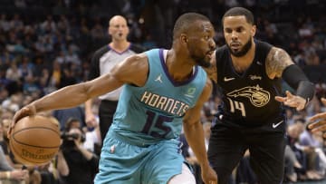 Apr 10, 2019; Charlotte, NC, USA; Charlotte Hornets guard Kemba Walker (15) drives in against Orlando Magic D.J. Augustin (14) during the second half at the Spectrum Center. Magic won 122-114. Mandatory Credit: Sam Sharpe-USA TODAY Sports