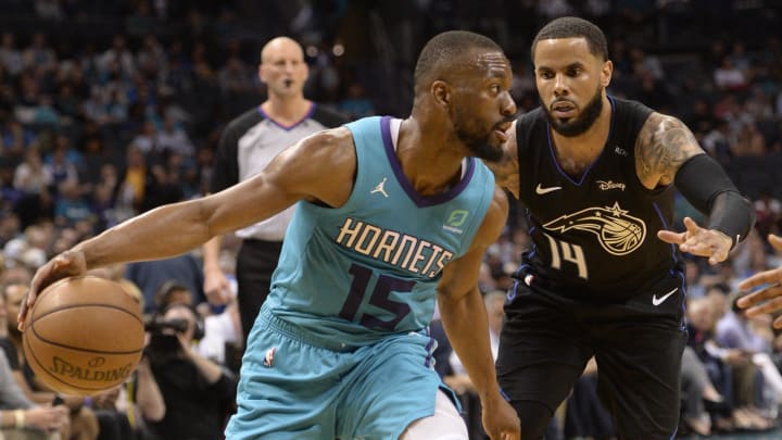 Apr 10, 2019; Charlotte, NC, USA; Charlotte Hornets guard Kemba Walker (15) drives in against Orlando Magic D.J. Augustin (14) during the second half at the Spectrum Center. Magic won 122-114. Mandatory Credit: Sam Sharpe-USA TODAY Sports