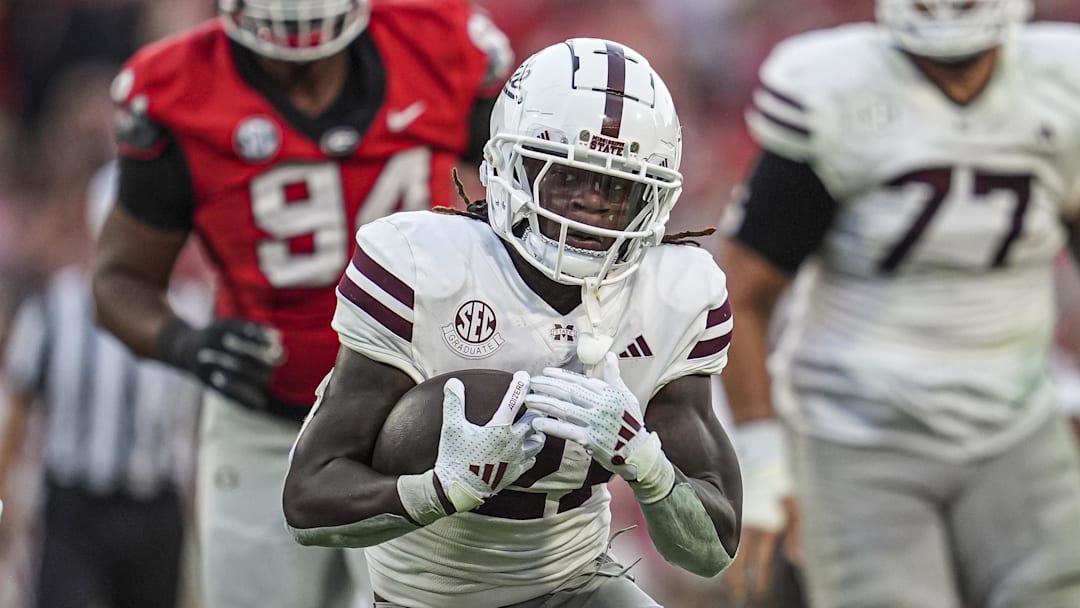 Oct 12, 2024; Athens, Georgia, USA; Mississippi State Bulldogs running back Davon Booth (21) runs the ball against the Georgia Bulldogs at Sanford Stadium. Mandatory Credit: Dale Zanine-Imagn Images