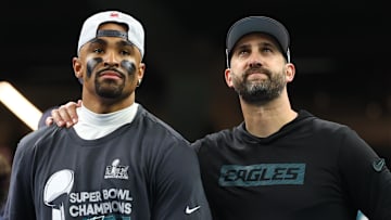 Feb 9, 2025; New Orleans, LA, USA; Philadelphia Eagles head coach Nick Sirianni and Philadelphia Eagles quarterback Jalen Hurts (1) on the podium after defeating the Kansas City Chiefs in Super Bowl LIX at Ceasars Superdome. Mandatory Credit: Mark J. Rebilas-Imagn Images
