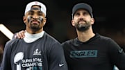 Feb 9, 2025; New Orleans, LA, USA; Philadelphia Eagles head coach Nick Sirianni and Philadelphia Eagles quarterback Jalen Hurts (1) on the podium after defeating the Kansas City Chiefs in Super Bowl LIX at Ceasars Superdome. Mandatory Credit: Mark J. Rebilas-Imagn Images