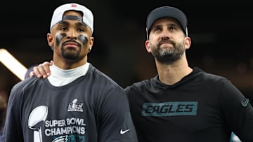 Feb 9, 2025; New Orleans, LA, USA; Philadelphia Eagles head coach Nick Sirianni and Philadelphia Eagles quarterback Jalen Hurts (1) on the podium after defeating the Kansas City Chiefs in Super Bowl LIX at Ceasars Superdome. Mandatory Credit: Mark J. Rebilas-Imagn Images