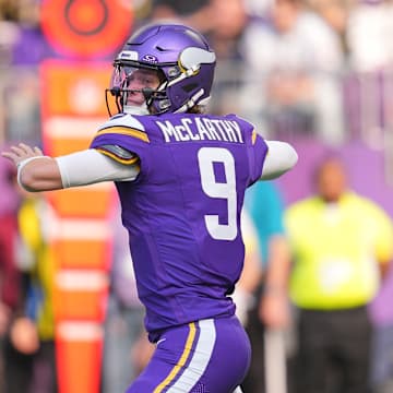 Nov 16, 2025; Minneapolis, Minnesota, USA; Minnesota Vikings quarterback J.J. McCarthy (9) throws downfield during the first quarter against the Chicago Bears at U.S. Bank Stadium.